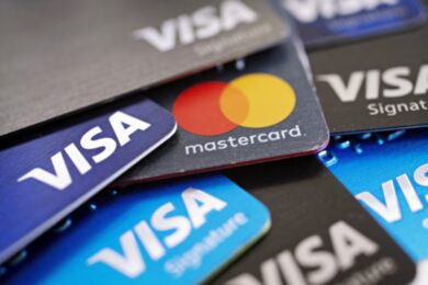 Visa and Mastercard near settlement with merchants, would lower fees: WSJ Reports